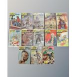 A collection of vintage Classics Illustrated comics including Alice in Wonderland,