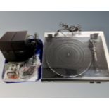 A Lenco L-3867 USB turntable together with a pair of Yamaha mini speakers.