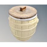 A vintage glazed stoneware lidded crock pot in the form of a barrel.