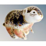 A Royal Crown Derby riverbank beaver paperweight, #3597 of 5000, with silver stopper.