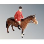A Beswick huntsman seated on horse no. 1501 CONDITION REPORT: Good condition.