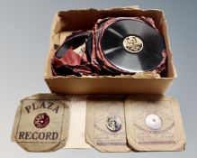 A box containing vinyl 78's