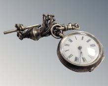 A continental silver fob watch with chain and tassel fob