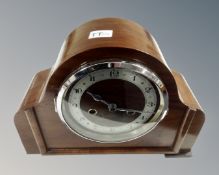 An Art Deco mantel clock with silvered dial