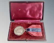 A George VI Imperial Service Medal in box of issue