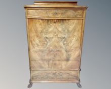 A nineteenth century Continental flame mahogany fall front cabinet, width 100 cm.