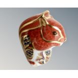 A Royal Crown Derby squirrel paperweight with gold stopper.