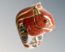 A Royal Crown Derby squirrel paperweight with gold stopper.