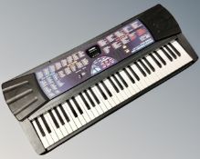 A Casio CTK-560 L electric keyboard together with three cameras, Halina,