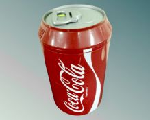 A mini-fridge in the form of a Coca-Cola can. CONDITION REPORT: No lead.