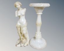 An Alabaster figure of a nude female, together with a smoker's stand,