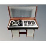 A Decca Sound turntable with integrated speakers in rosewood effect case CONDITION