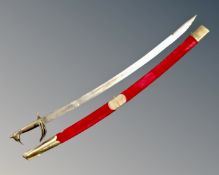 An Indian sabre in velvet scabbard.