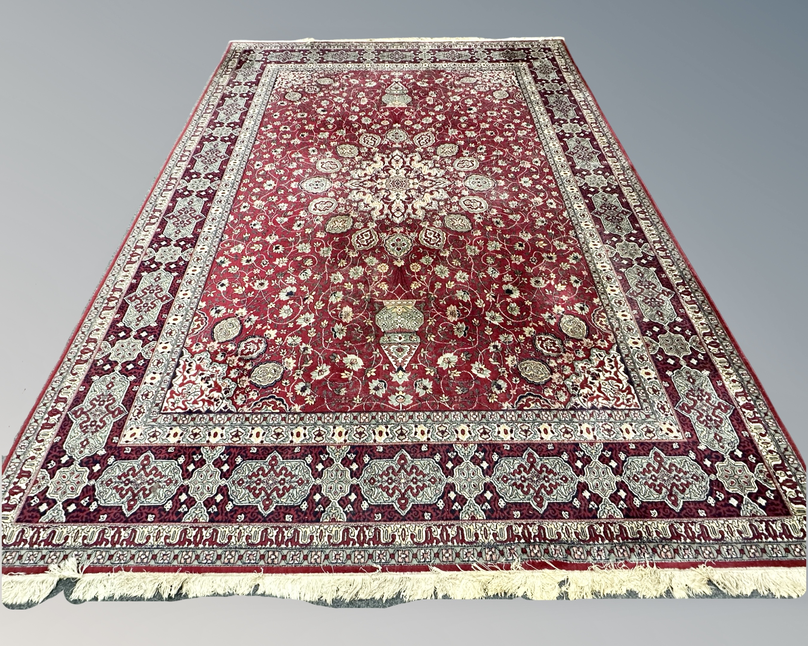 A good machined carpet of Persian Ardabil design, 300cm by 400cm.