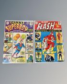 Two vintage DC special edition comics, Giant Flash annual and Giant Superboy annual issue #1.