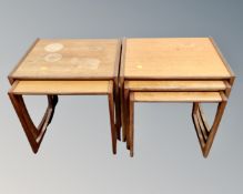 A teak nest of three tables together with a further nest of tables