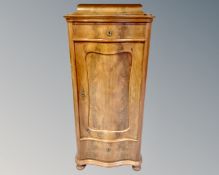 A nineteenth century continental walnut serpentine fronted hall cabinet ,