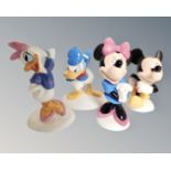 Four Royal Doulton Mickey Mouse collection Disney figures including Donald Duck, Daisy Duck,