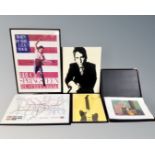 A group of framed pictures including Bruce Springsteen Born in the USA tour poster,