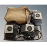 Three vintage Kodak Brownie 127 cameras.