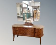 An early 20th century burr walnut dressing table with triple mirror back.