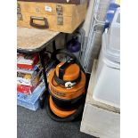 A Vax vacuum cleaner together with a Genie express vac