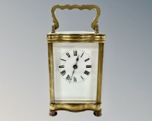 A French brass carriage clock, with unsigned movement and platform escapement,