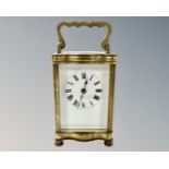 A French brass carriage clock, with unsigned movement and platform escapement,