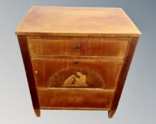 A 19th century continental satinwood three drawer chest.