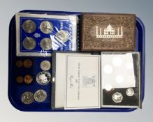 A tray containing Indian bone inlaid trinket box together with British coins including United