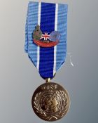 A replica UN medal