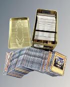 A collection of Yu-Gi-Oh trading cards in metal tin.