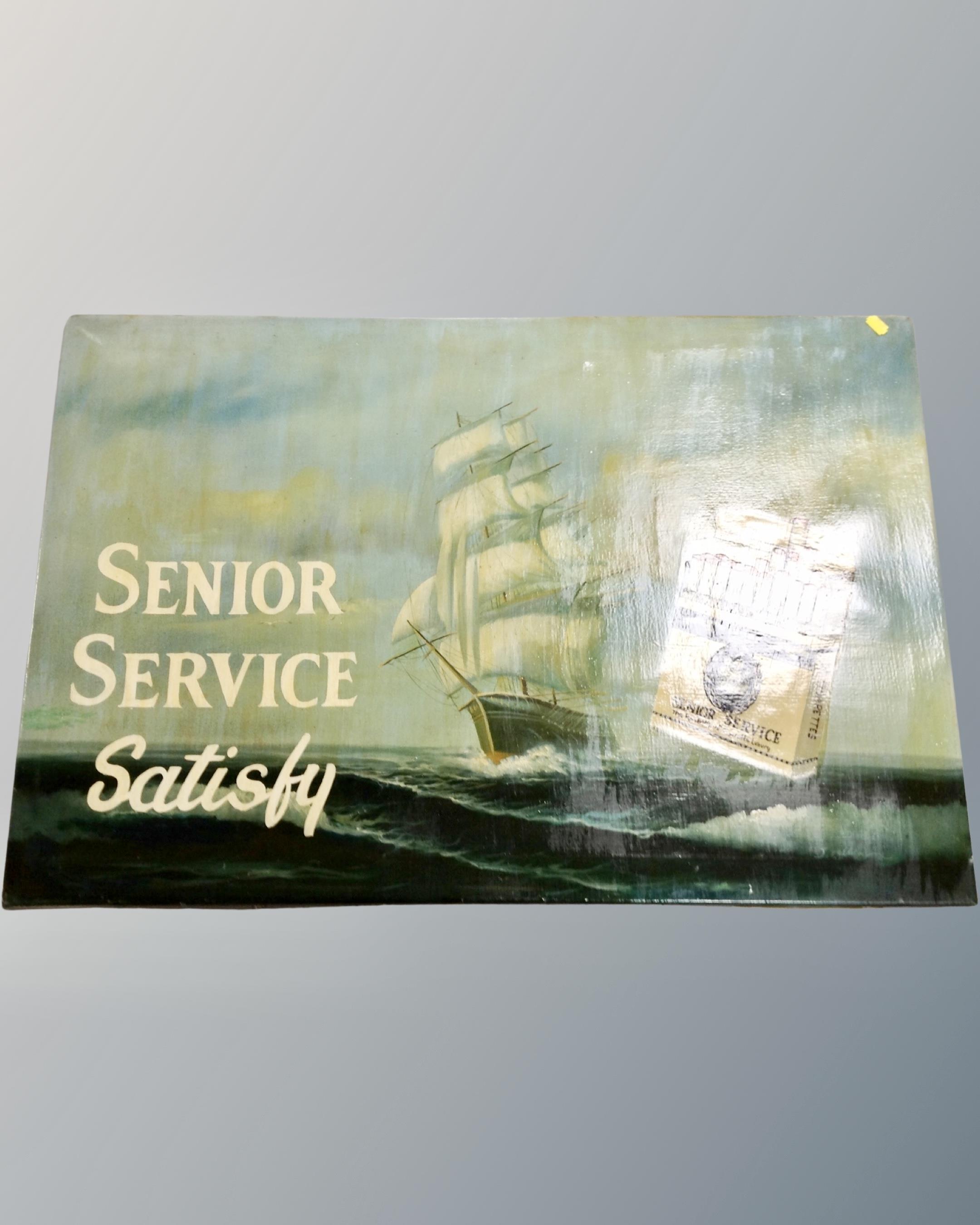 A painted Senior Service cigarette advertisement on canvas, 91cm by 61cm.