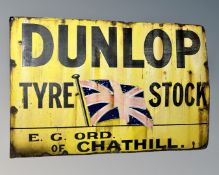 An early 20th century enamelled advertising sign " Dunlop Tyre Stock",