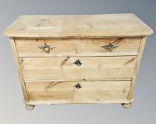 A 19th century Scandinavian pine chest of four drawers.