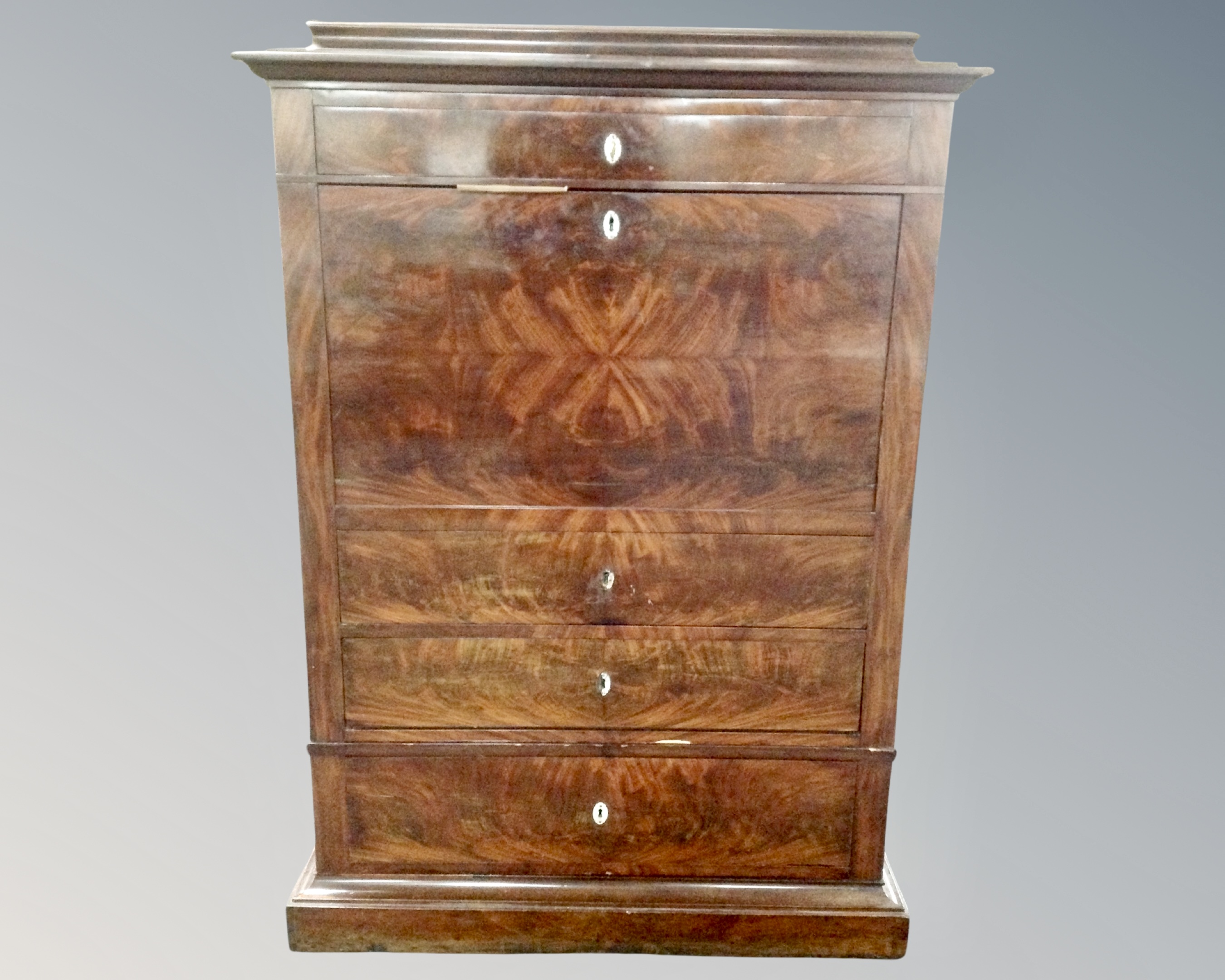 A Biedermeier mahogany fall front secretaire cabinet.