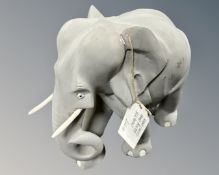 A wooden painted elephant figure, height 26 cm.