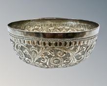 An Indian silver dish, with floral embossed detail, diameter 6.75cm.