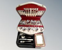 A tray of German mantel clock in box, canteen of stainless steel cutlery,