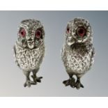 A pair of Victorian novelty silver salt and pepper sifters in the form of owls,