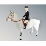 A Beswick huntswoman on grey horse no.1730. CONDITION REPORT: Good condition.