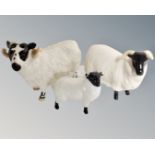 A Beswick ewe, a tup and a lamb.
