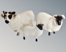 A Beswick ewe, a tup and a lamb.