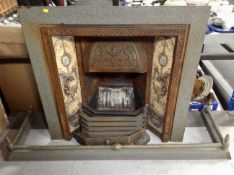 A Victorian cast iron tiled fire insert together with a fire curb CONDITION REPORT: