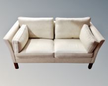 A late 20th century Scandinavian two seater settee.
