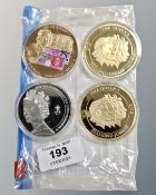 Four large commemorative Queen Elizabeth II coins (4)