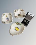 Three hand painted Dresden porcelain dishes together with two silver dress rings.