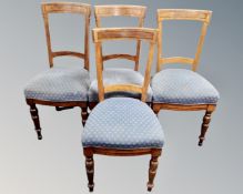A set of four 19th century burr walnut dining chairs.