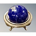 A Gemstone globe on stand, height 48 cm.