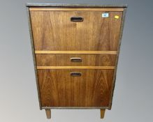 A 20th century teak veneered record cabinet.